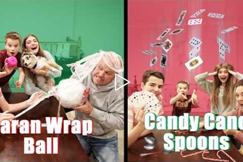 Christmas Party Games! Saran Wrap Ball And Candy Cane Spoons!